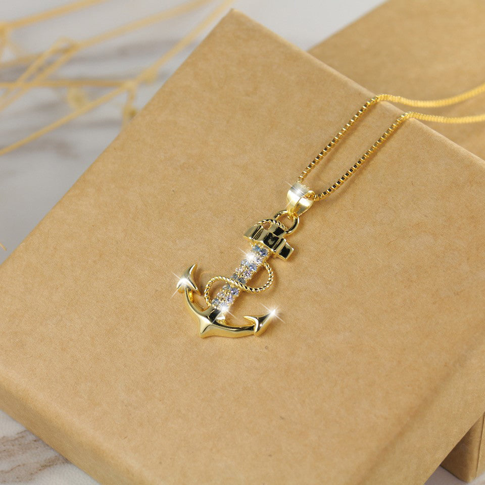 Anker Halskette fuer Damen in edlem Gold-Look, symbolisiert Vertrauen und Halt – eleganter Symbolschmuck mit Bedeutung