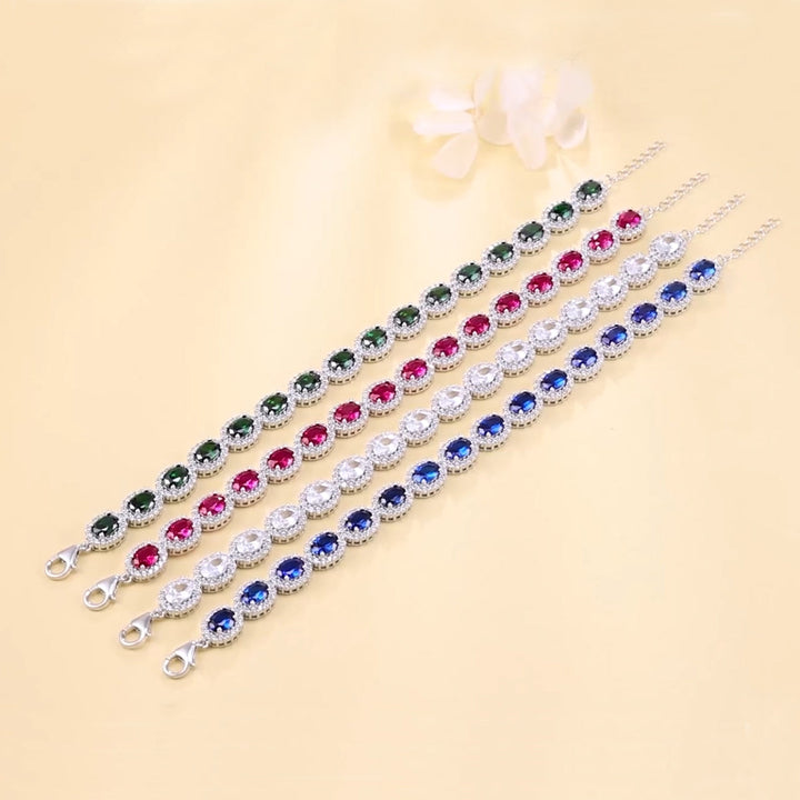 Damen Armbänder „Fame“ in allen Farben – Saphirblau, Rubinrot, Smaragdgrün, Diamantweiß – luxuriöse Zirkonia-Armbänder in Silber für festliche Outfits.
