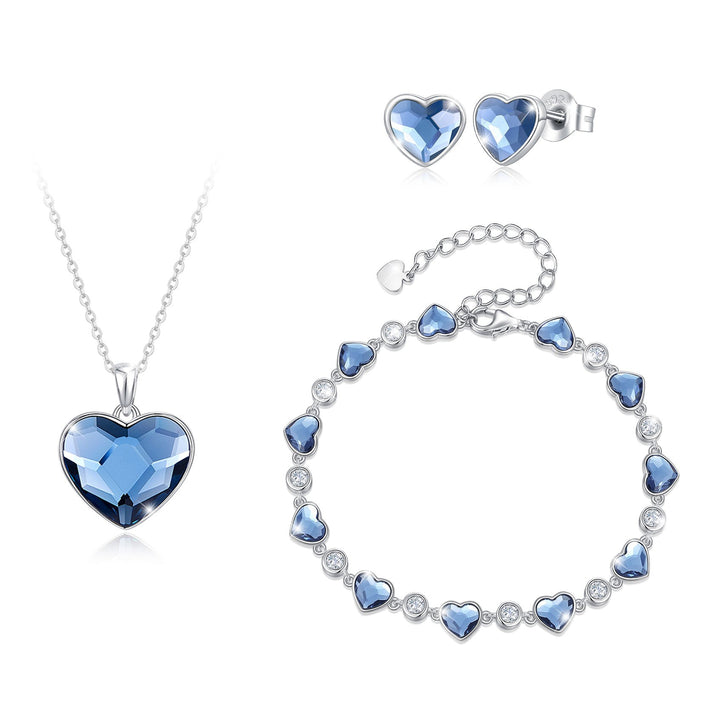 Exklusives Schmuckset für Damen aus 925er Sterlingsilber mit blauen herzförmigen Zirkonia – bestehend aus Halskette, Armband und Ohrsteckern in Silberoptik.